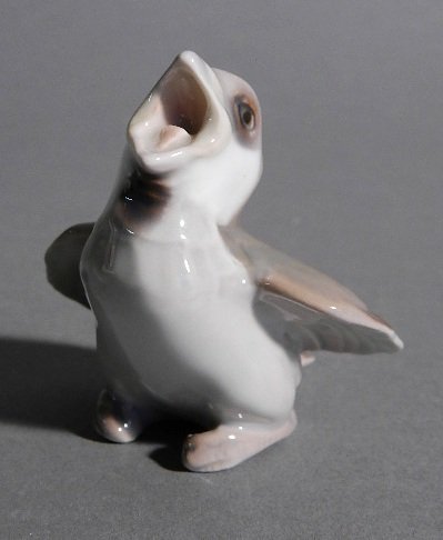Bing & Grondahl porcelain figurine: Bing & Grondahl porcelain figurine- Young Sparrow, no. 1852A, marked on bottom, good condition. 2 3/4''h
