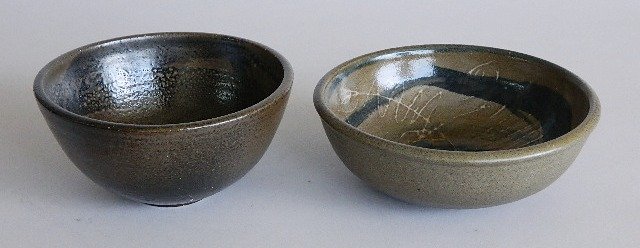 Toshiko Takaezu 2 ceramic bowls: Toshiko Takaezu (American 1922-2011)- Untitled- 2 ceramic bowls, both monogrammed on bottom, 1 has chip at side. 2 1/2 x 7 1/4''; 3 1/2 x 6 1/2'' Provenance: John Paul Miller collection, Cleveland, Oh