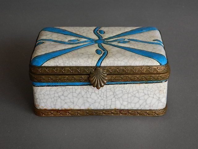 A Charles Catteau Boch Freres ceramic box: A Charles Catteau Boch Freres ceramic box, crackleware glaze with stylized blue design with bronze mounts, marekd. 4 x 5 1/2 x 2 1/2''