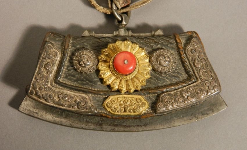 19th c. Tibetan Tinder pouch: 19th c. Tibetan Tinder pouch with leather, steel, gilt and carnelian, wear throughout. 2 1/2 x 5 1/4 x 3/4''