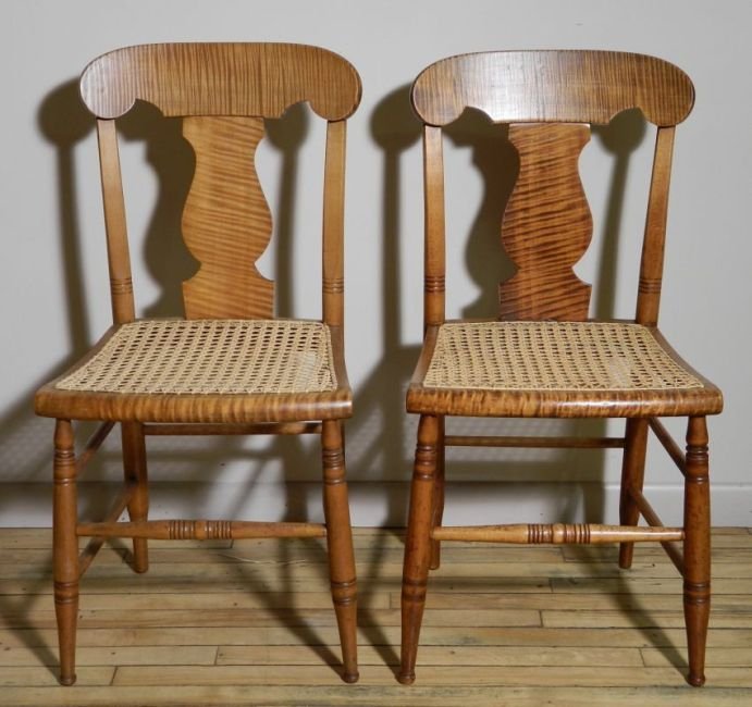Pair of tiger maple side chairs: Pair of tiger maple side chairs with caned seats.