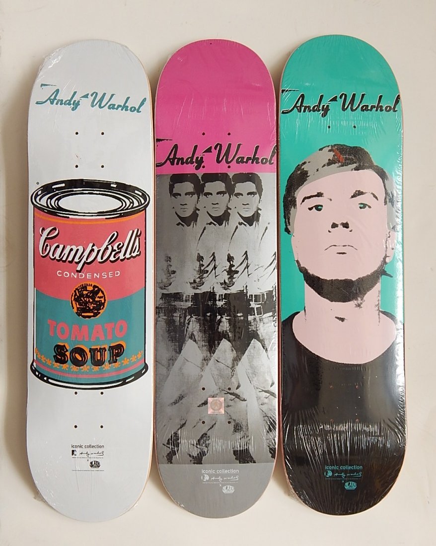 after Andy Warhol skateboards: after Andy Warhol (American 1928-1987)- Untitled- 3 skateboard decks, copyright the Andy Warhol Foundation for the Visual Arts, designer Alien Workshop, very good condition. 32 x 8'' ea.