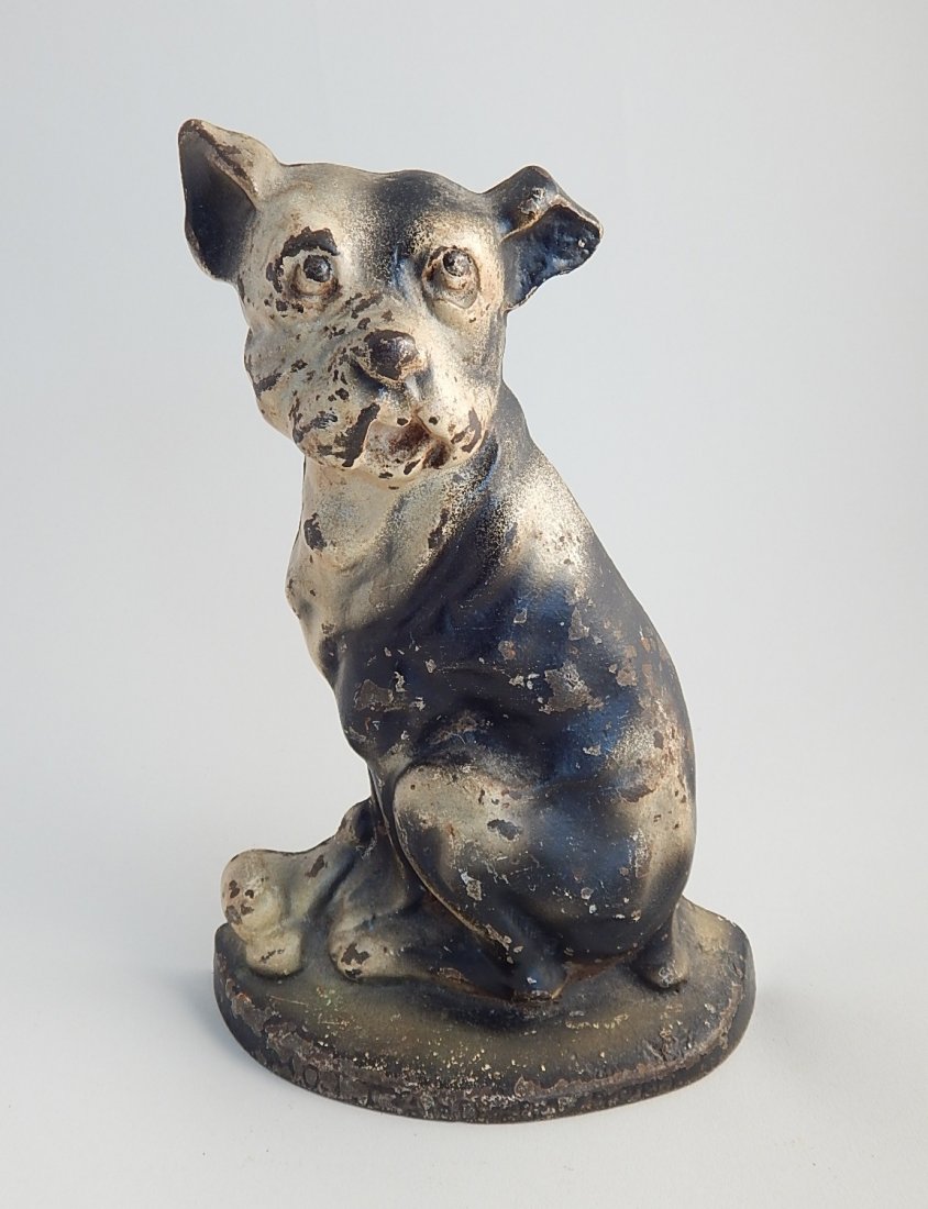 Vintage cast iron doorstop- Mutt and His Bone: Vintage cast iron doorstop- Mutt and His Bone, wear throughout, loss to painted surface. 8 1/2''h