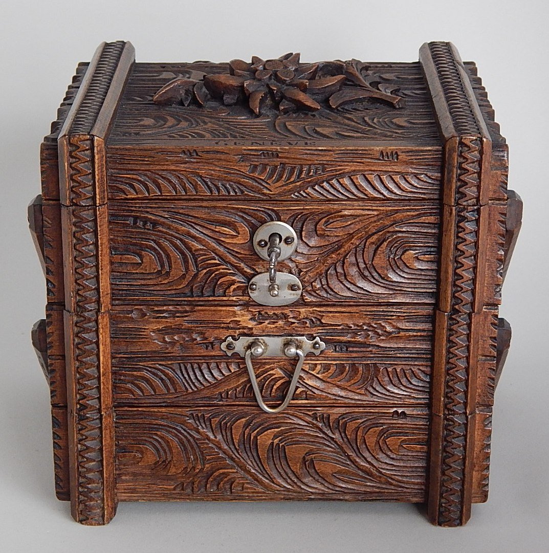 Carved Black Forest jewelry box: Carved Black Forest jewelry box, with sterling silver fittings and mirrored interior lid, good condition. 7 x 5 1/4 x 6 1/2''