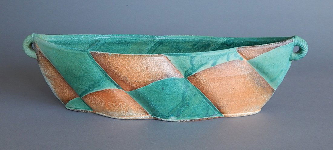 Jeff Oestreich glazed earthenware: Jeff Oestreich (American 1947- )- Center Bowl- glazed earthenware, artist stamp 'J.O.' at bottom, very good condition. 4 3/8 x 4 3/4 x 17''