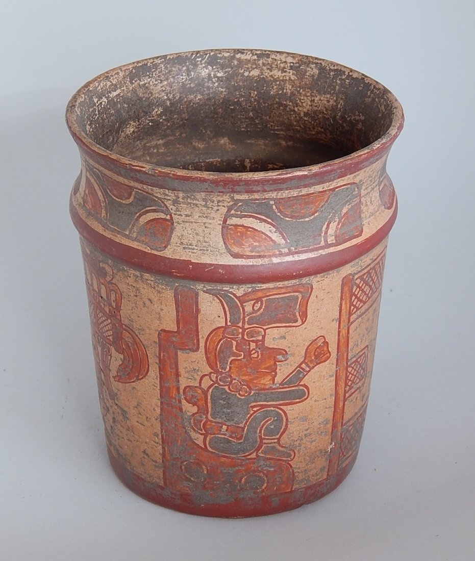 Mayan polychrome vase: Mayan polychrome vase, ornamented with figures and red band at the shoulder, slightly flared lip. 6''h