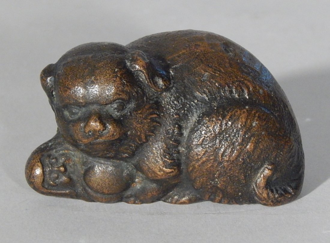 Tiffany Studio bronze: Tiffany Studio bronze of Dog and Pup, stamped 'Tiffany Studios / New York' on bottom. 1 1/2''h