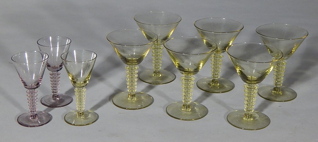 Set of 6 Morgantown amber cocktail glasses: Set of 6 Morgantown amber cocktail glasses; along with 3 smaller cocktail glasses, amber and amethyst, with ''straw'' shape stem, good condition. 4 3/8''h; 4''h