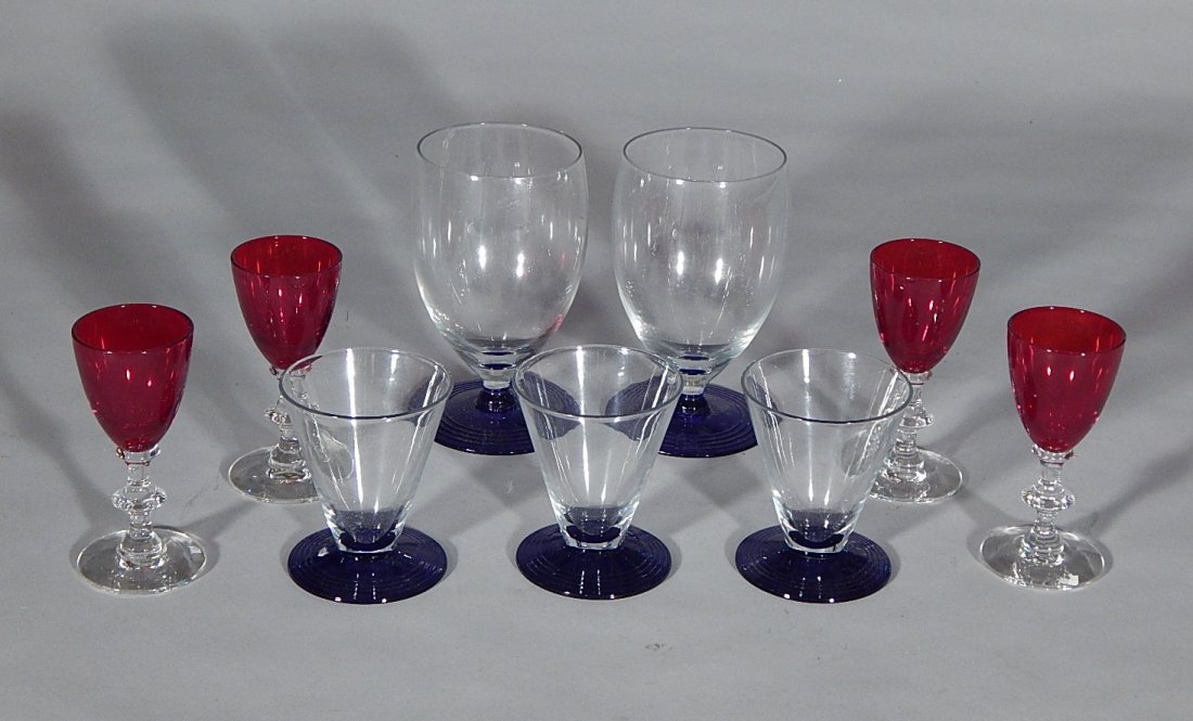 9 Assorted Morgantown cocktail glasses: 9 Assorted Morgantown cocktail glasses, 5 with blue bases and 4 in red, old sticker remnants, otherwise good condition. 5''h, 3''h and 4''h
