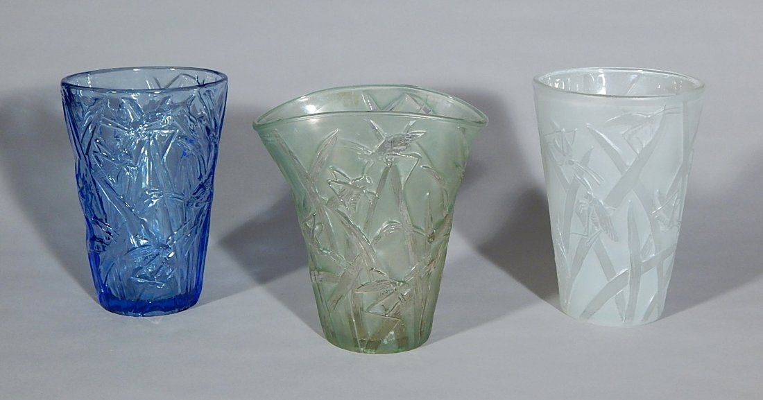 3 Phoenix Art Glass vases: 3 Phoenix Art Glass vases, with grasshopper ornamentation, in frosted white, celadon and blue, old sticker remnants and a couple minor chips to bottom of celadon vase. approx. 8''h