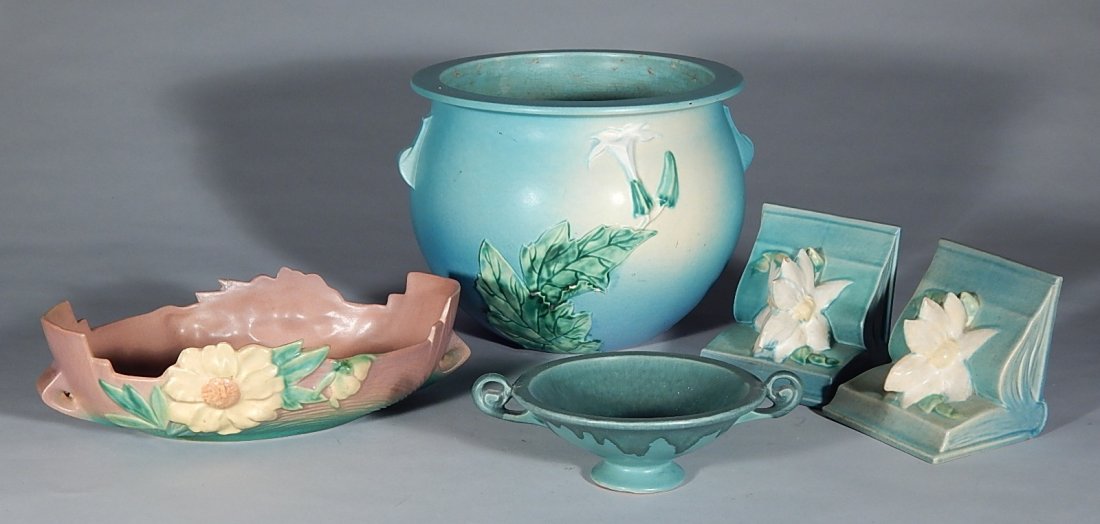 5 Roseville Pottery pieces: 5 Roseville Pottery pieces- 1.) Peony bowl, shape no. 432-12, raised mark, repaired chip; 2.) Thorn Apple blue jardiniere, shape no. 638-9, raised mark, note: chips; 3.) Carnelian I footed bowl, ink s