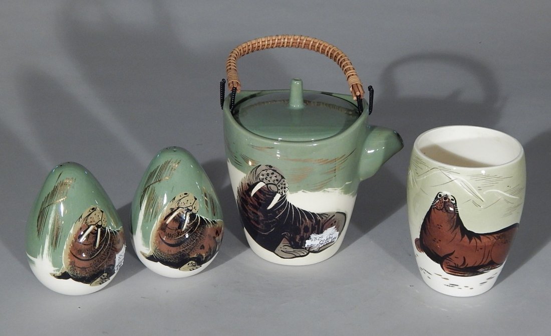 Matthew Adams pottery teapot: Matthew Adams pottery teapot and salt and pepper shaker, decorated with a walrus; along with a Sascha Brastoff vase decorated with a seal, all signed. 7'', 5 1/4'' and 5 1/2''