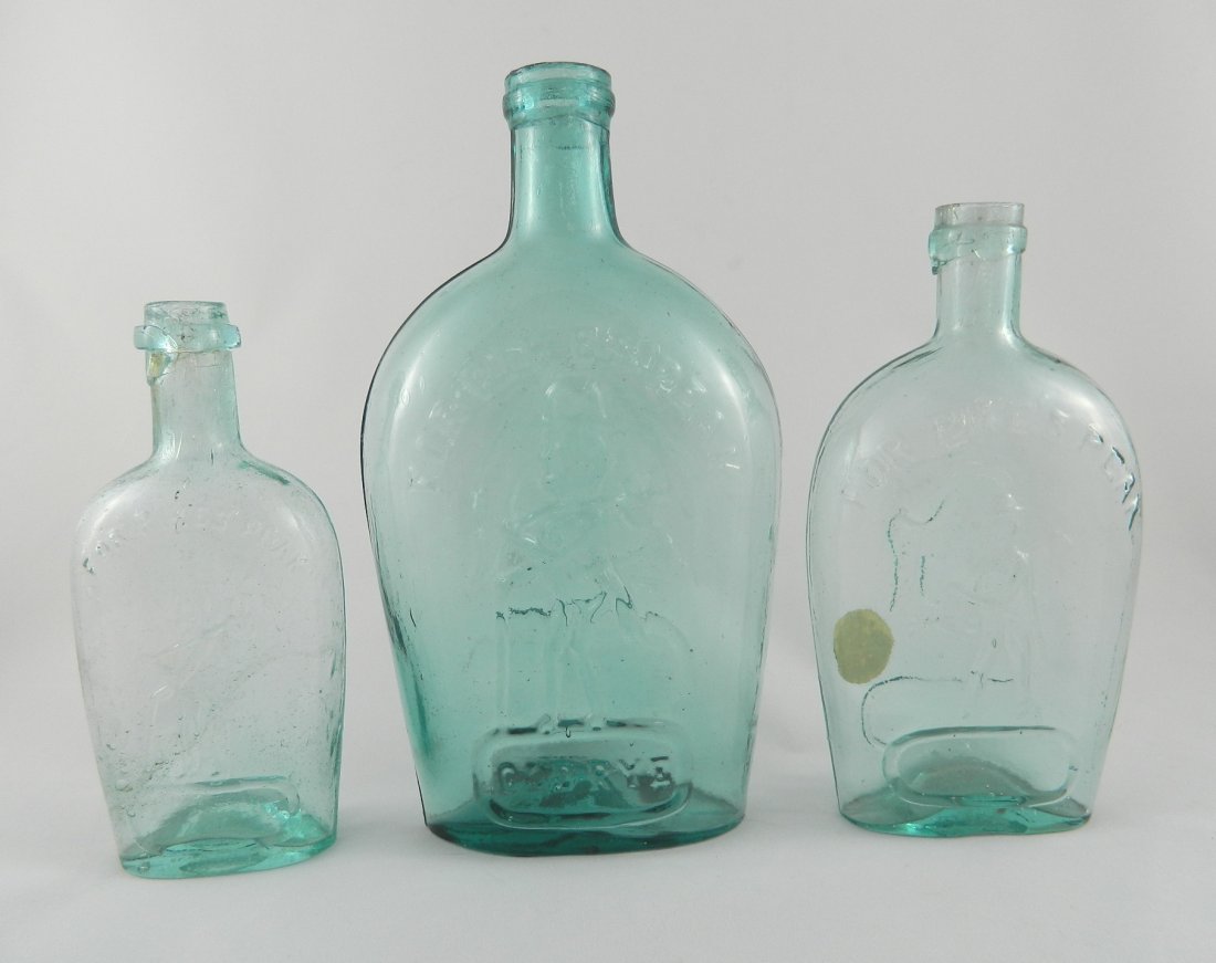 Flasks - 3 Pike's Peak aqua: Flasks- 3 Pike's Peak aqua- 1.) 'For Pike's Peak'- prospector to left with derby, pack and cane above plain oval panel- reverse plain, U.R.#12 G 7, GXI-5, 1/2 pint; 2.) 'For Pike's Peak'- prospector w