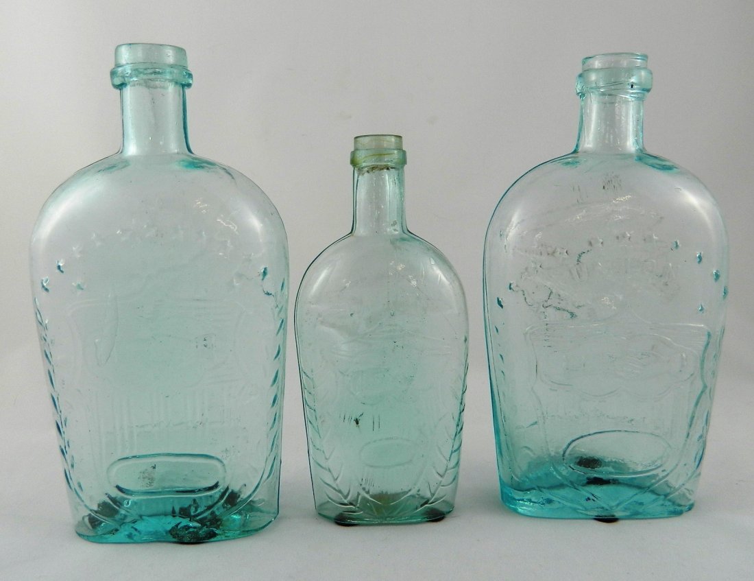 3 Flasks - Clasped hands aqua: Flasks- 3 Clasped hands aqua- 1.) Clasped hands in shield below 'Union' and thirteen stars- Eagle and banner above plain panel, pint, scratches on shoulder; 2.) Clasped hands in shield below thirteen