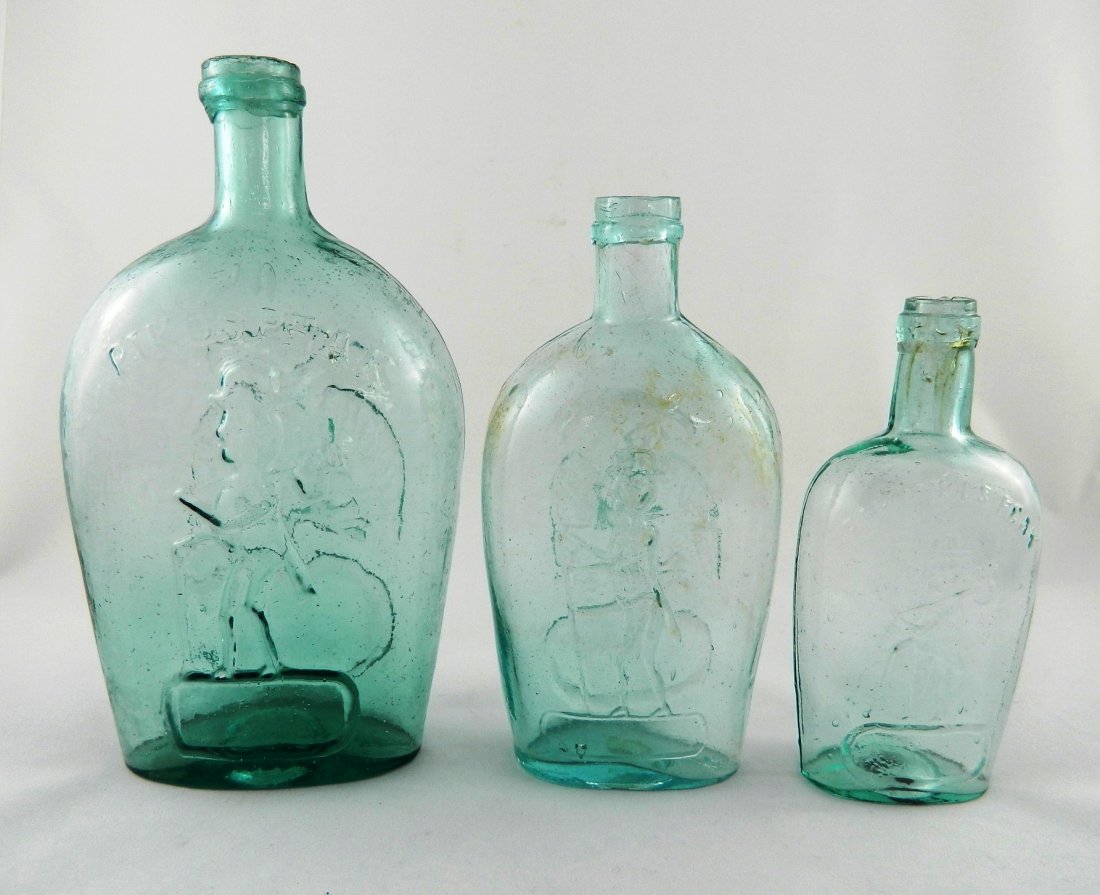 3 aqua 'Pike's Peak' flasks: Flasks- 3 aqua 'Pike's Peak'- 1.) 'For Pike's Peak'- prospector with hat cane and pack in left hand on left shoulder above round ended oblong frame- plain, GXI-5, 1/2 pint, chips around mouth; 2.) 'Fo