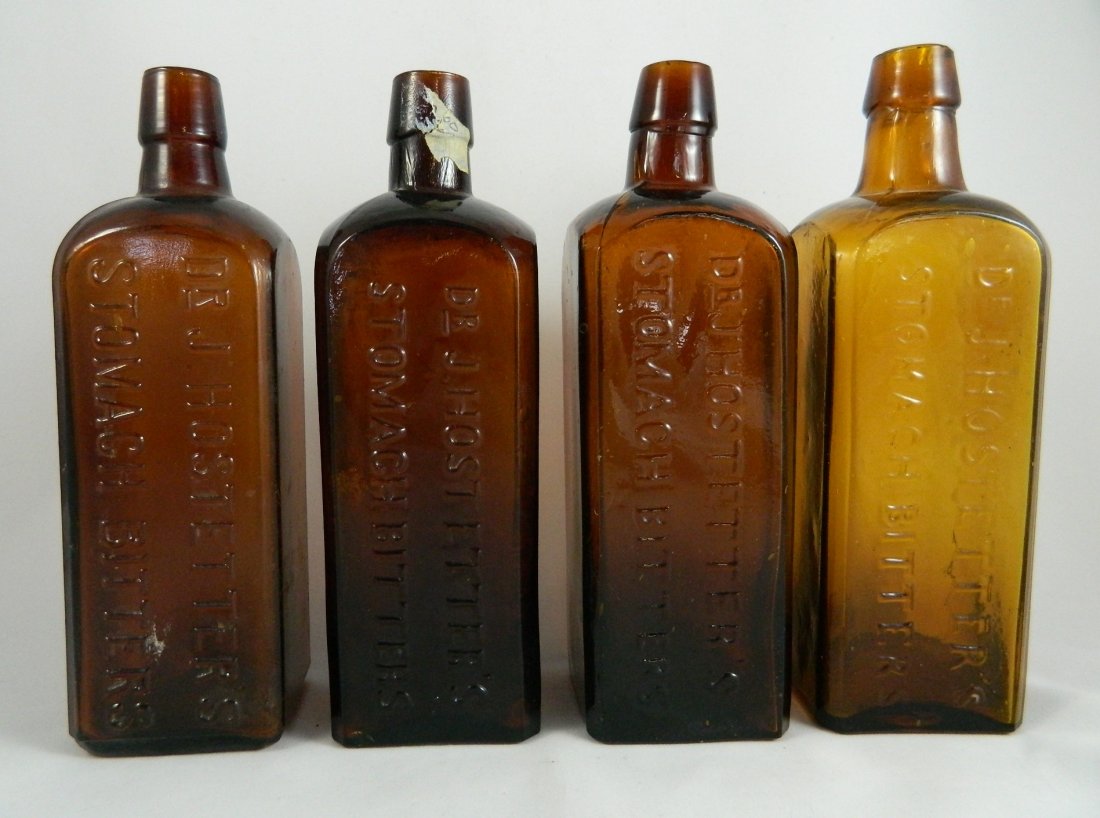4 Dr. Hostetter's bitters bottles (1 of 3)