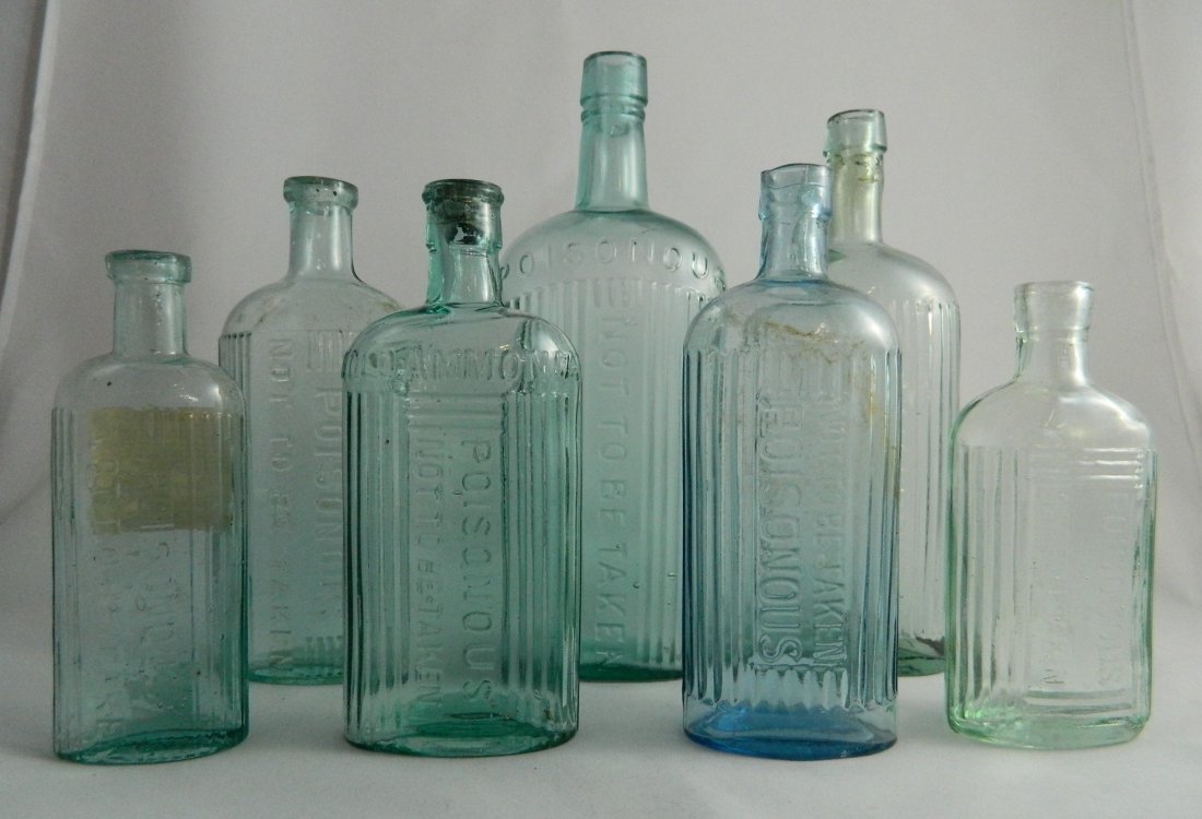7 Poison aqua oval bottles (1 of 6)