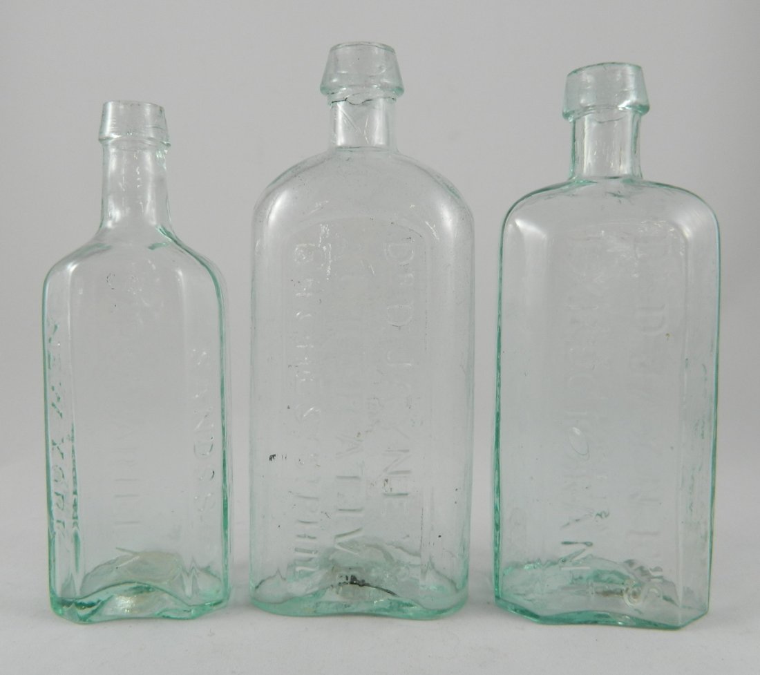 3 aqua medicine bottles (1 of 7)
