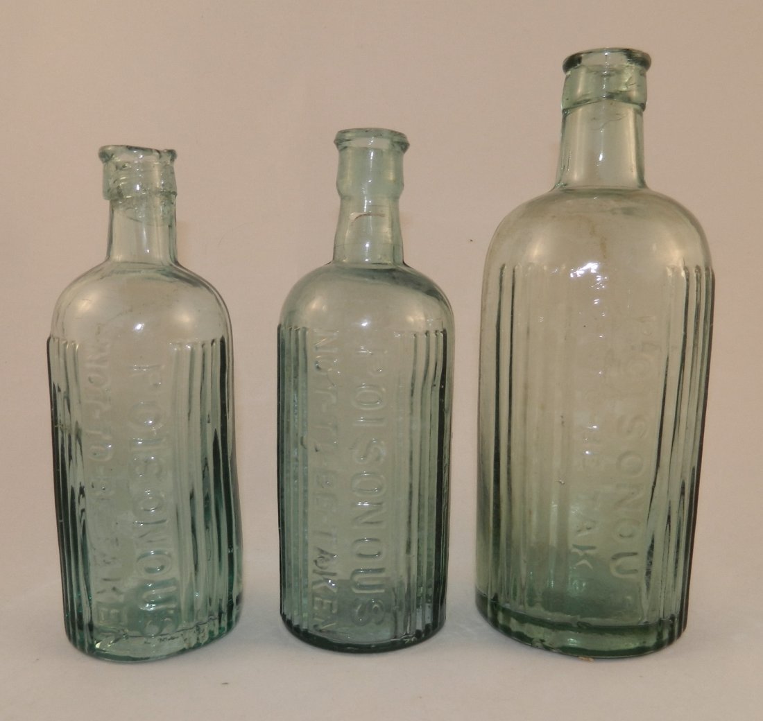 3 Poison aqua round bottles (1 of 3)