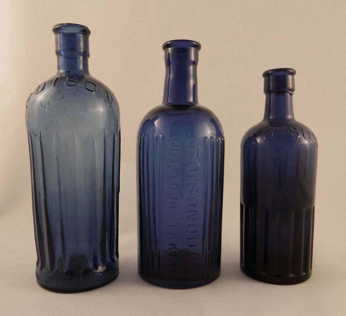 3 Poison round cobalt bottles (1 of 3)
