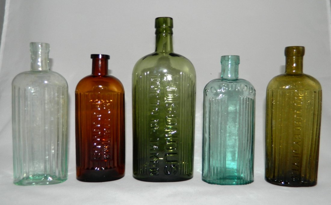 5 Poison oval bottles (1 of 5)