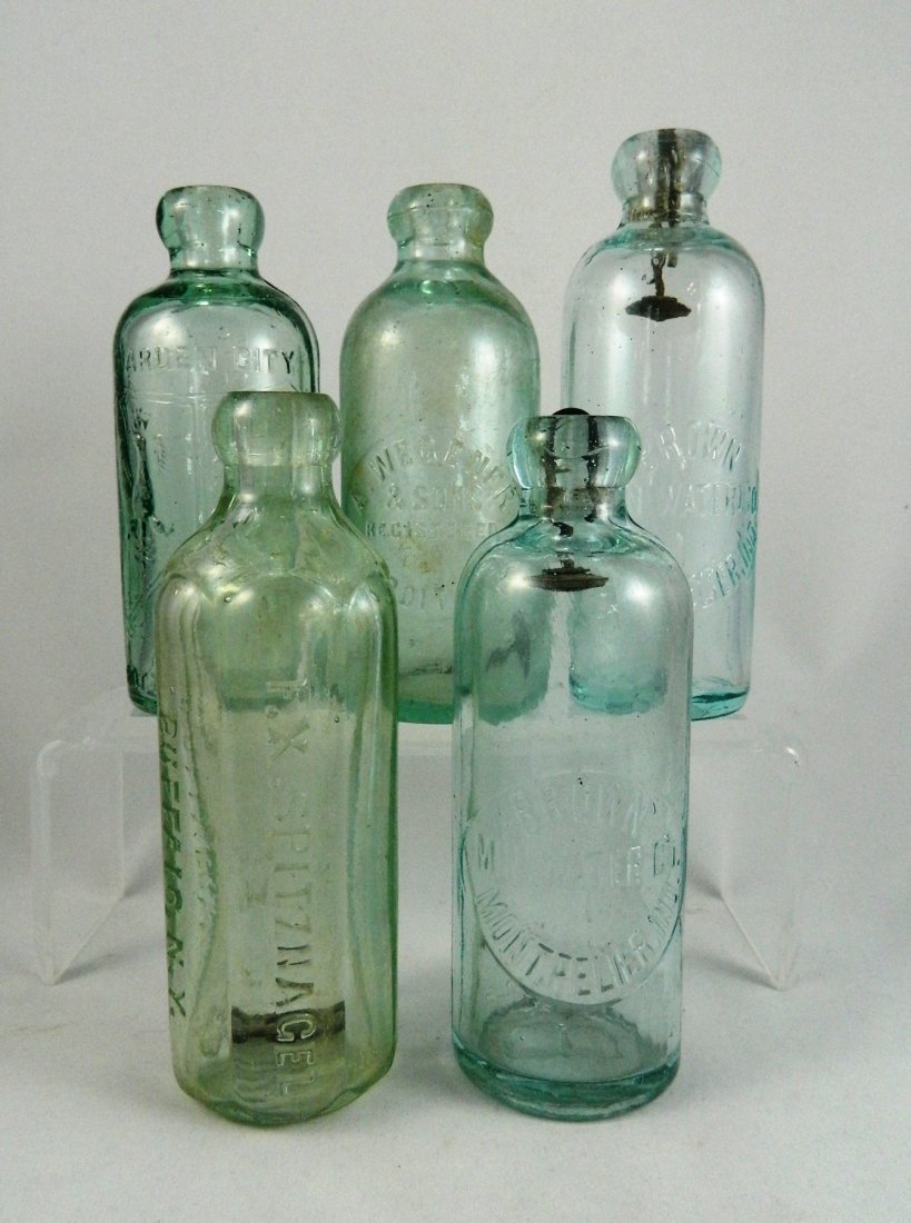 5 Hutchinson Soda bottles: Soda- 5 Hutchinson- 1 & 2.) 'Brown/ Min. Water Co./ Montpelier, IN' 3.)- 'A. Wegener & Sons/ Detroit MI' 4.)- 'F. E. Spitznagel/ Buffalo NY' 5.)- 'Garden City/ Bottling Work/ Chicago IL' 6 3/4''