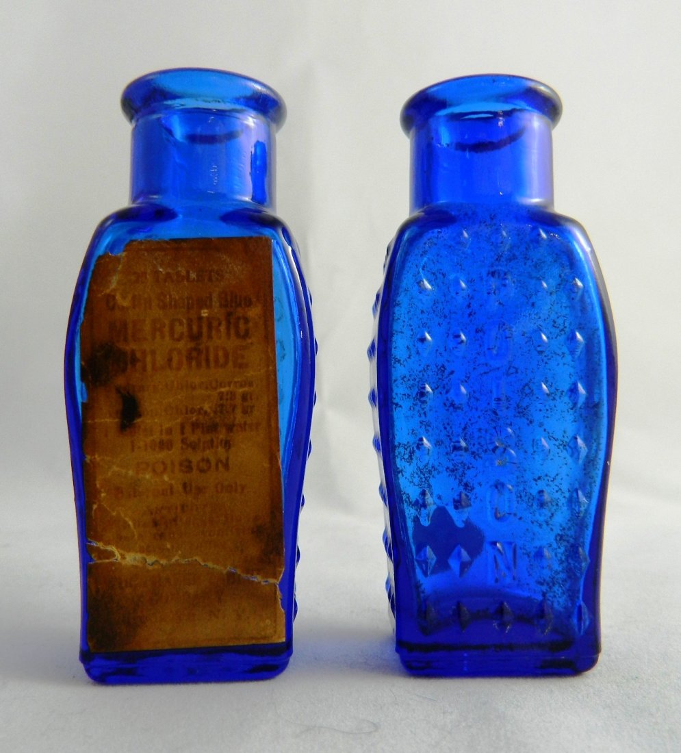 Poison - 2 cobalt coffin shape bottles (1 of 3)