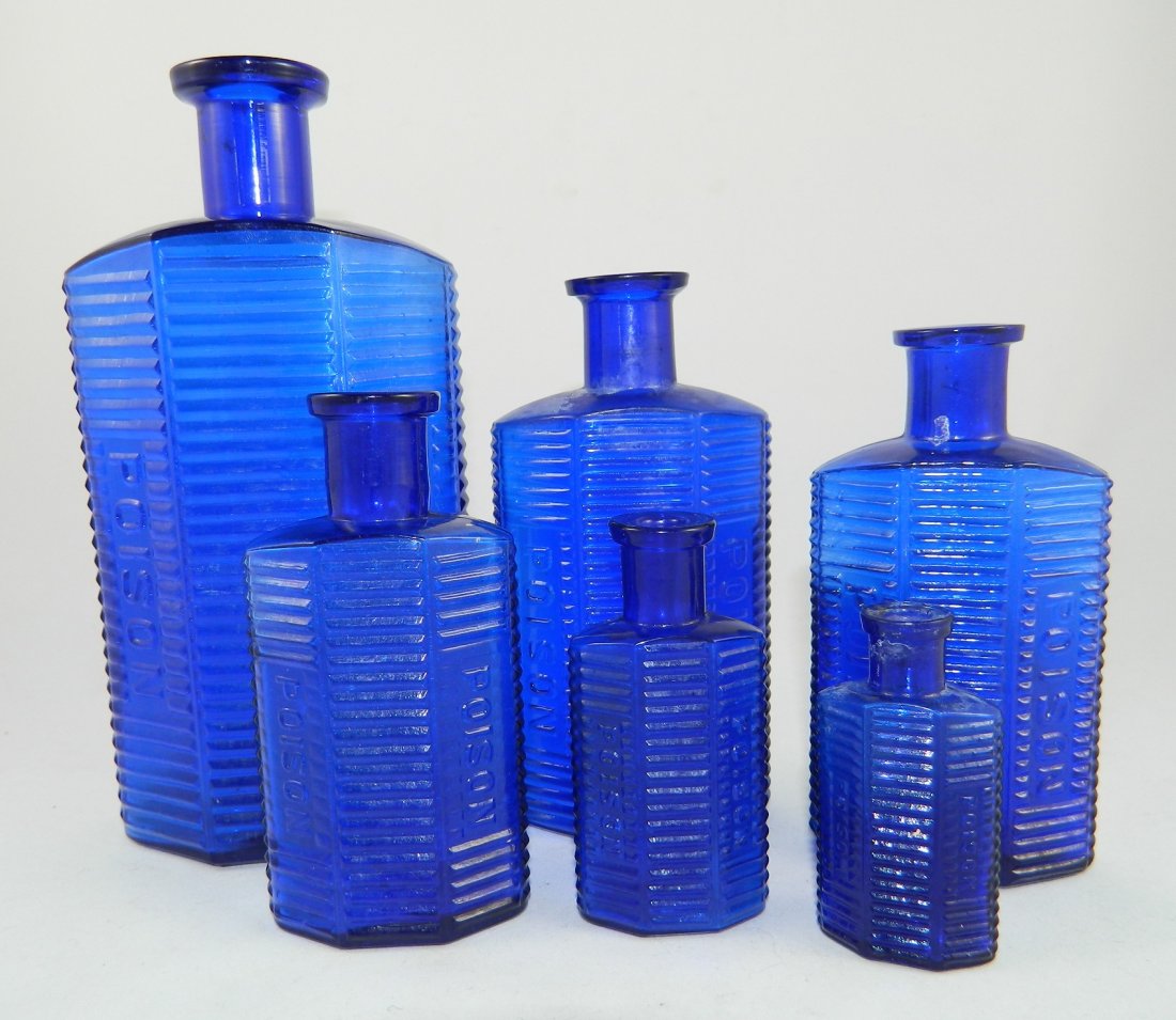 Poison 6 cobalt irregular horizontal bottles (1 of 3)