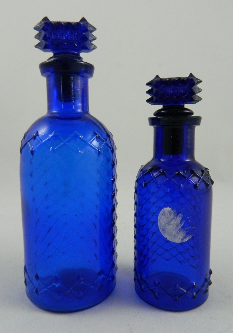Poison 2 round bottles with diamond pattern (1 of 3)