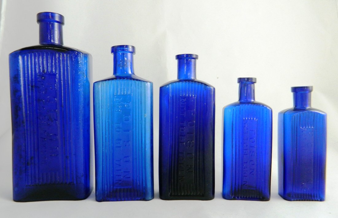 5 Poison cobalt rectangle bottles (1 of 3)