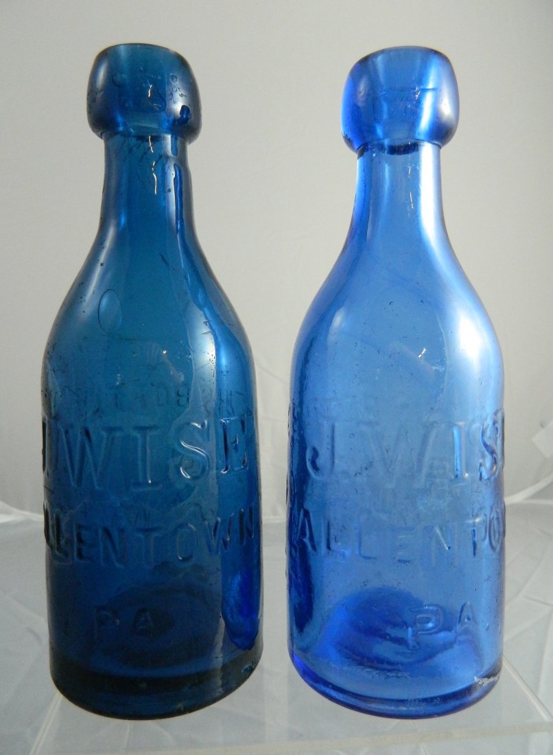 Soda bottles - 2 J. Wise Allentown PA: Soda- 2 'J. Wise / Allentown / PA - This Bottle / Belongs To / James Wise', blue collared blob mouth, smooth base. 7''h