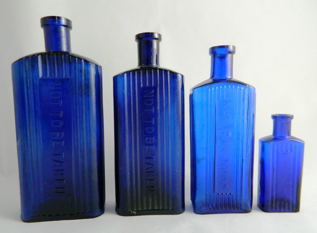 4 Poison rectangular cobalt bottles (1 of 4)