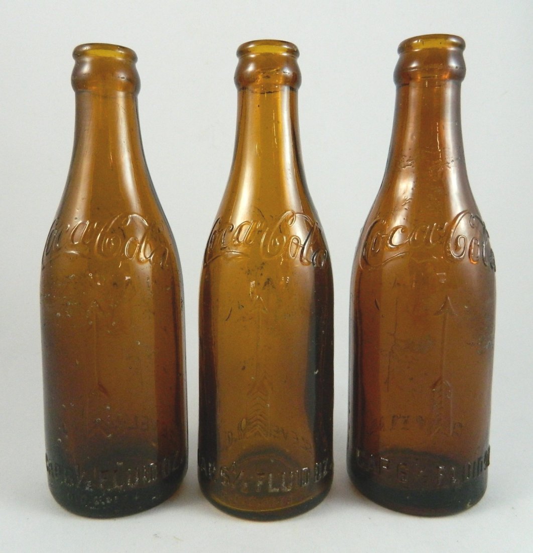3 Coca Cola Arrow Amber bottles (1 of 3)