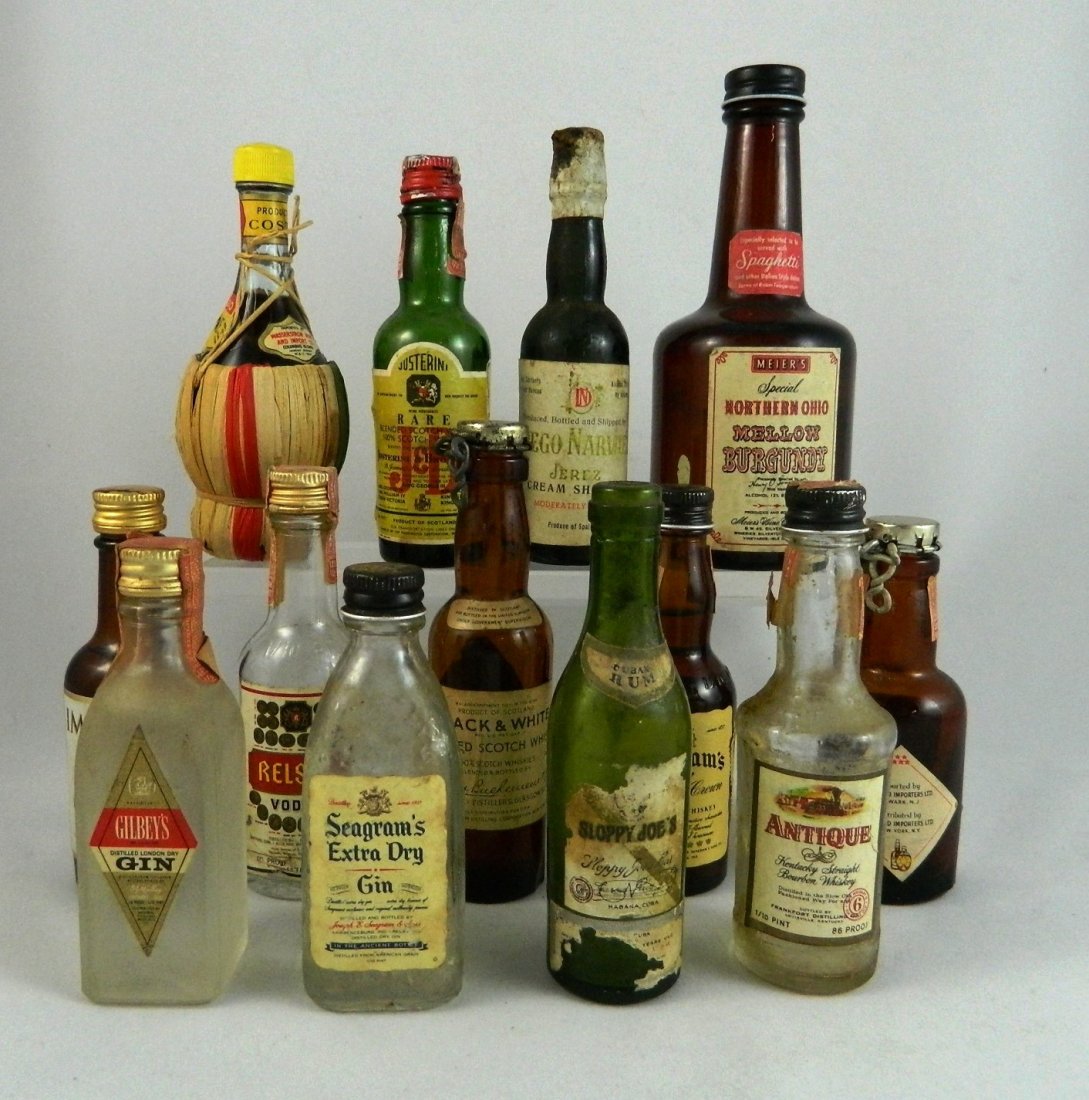Spirits - 12 miniature bottles: Spirits- 12 miniature bottles- including 'Seagrams Whiskey & Gin', 'Relska Vodka', 'Sloppy Joe's Cuban Rum', 'Gilbey's Gin', 'Diego Narvaez Sherry', etc., along with a miniature wine bottle 'Certaldo 
