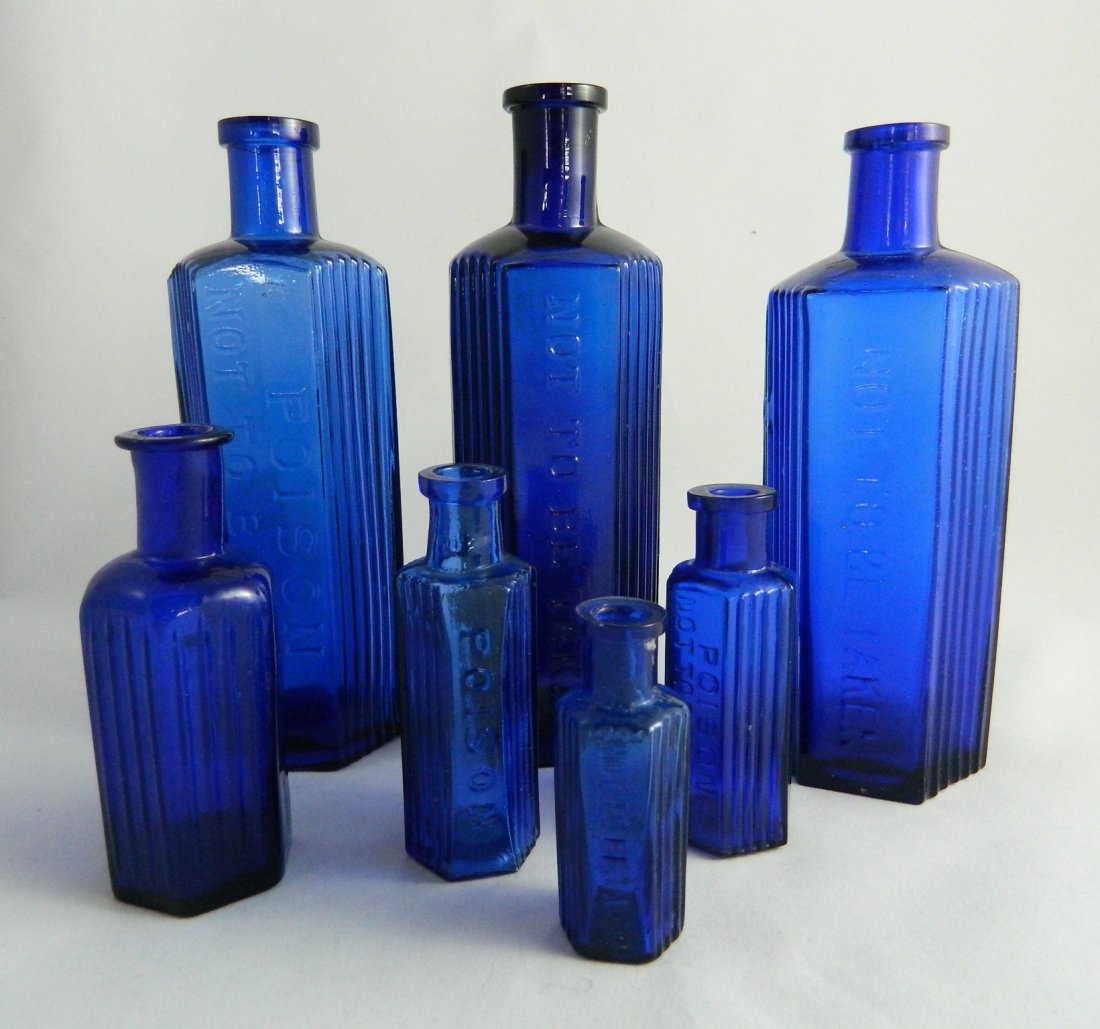 Poison 7 cobalt hexagonal bottles (1 of 6)
