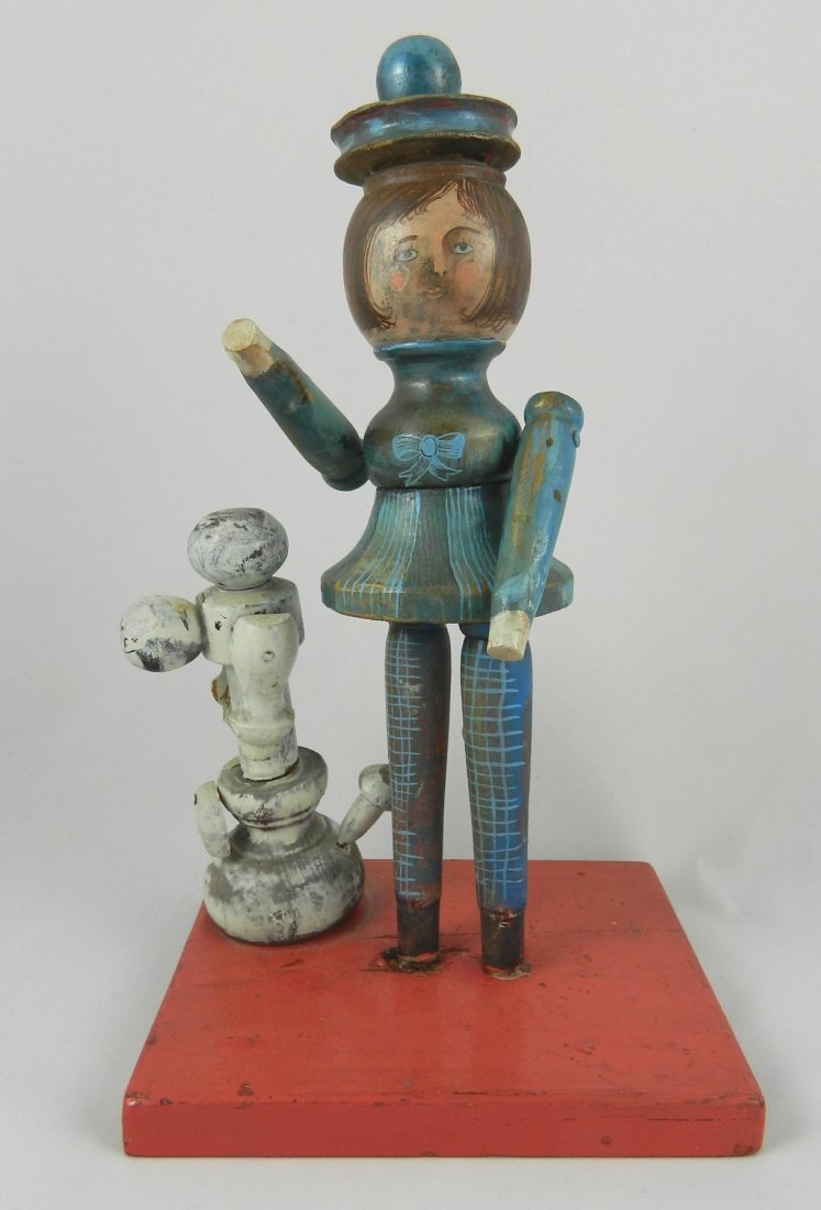 Mary Spain painted wood sculpture: Mary Spain (American 1934-1983)- Girl with Poodle- painted wood sculpture, 1967, signed Spain 67 on base. 11 1/2''h Provenance: Ross Widen Gallery.