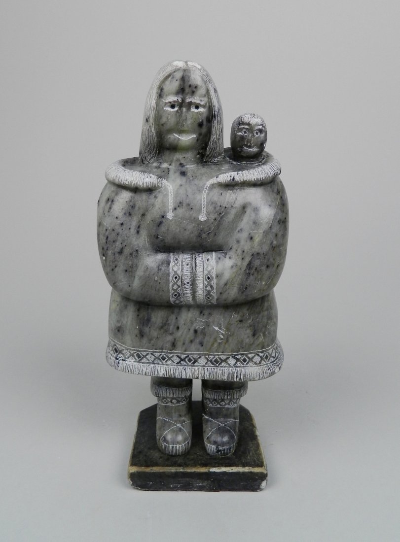 Inuit carved stone sculpture: Inuit carved stone sculpture- Mother and Child, some chips and scratches. 9 1/2''h