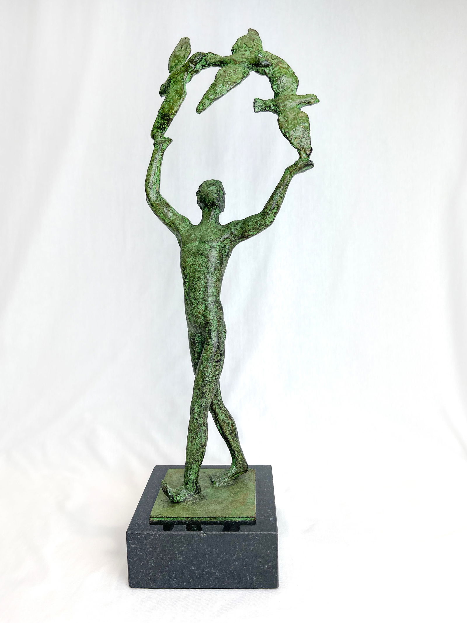 Global Views 5x6.5x20 Capturing Flight Retired Oxidized Iron Sculpture: Artist: Global Views Title: Capturing Flight Medium: Natural and Oxidized Brass on Black Granite Base Size: 5 w x 20 h x 6.5 d Weight: 10lbs. Edition: Retired Sculpture – Open Edition Whether