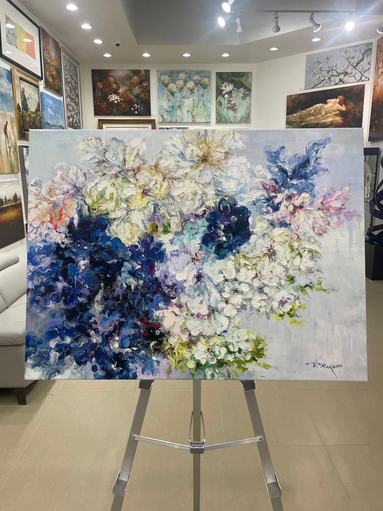 J. Morgan 27.25x37.75 Original Floral Painting: Artist: J. Morgan (b.1959) Korean Title: Blooming Cascade Medium: Oil on Canvas Art Size: 27.25h x 37.25w Edition: Original Signature: Signed in paint on the front, bottom right corner of canvas. Artw