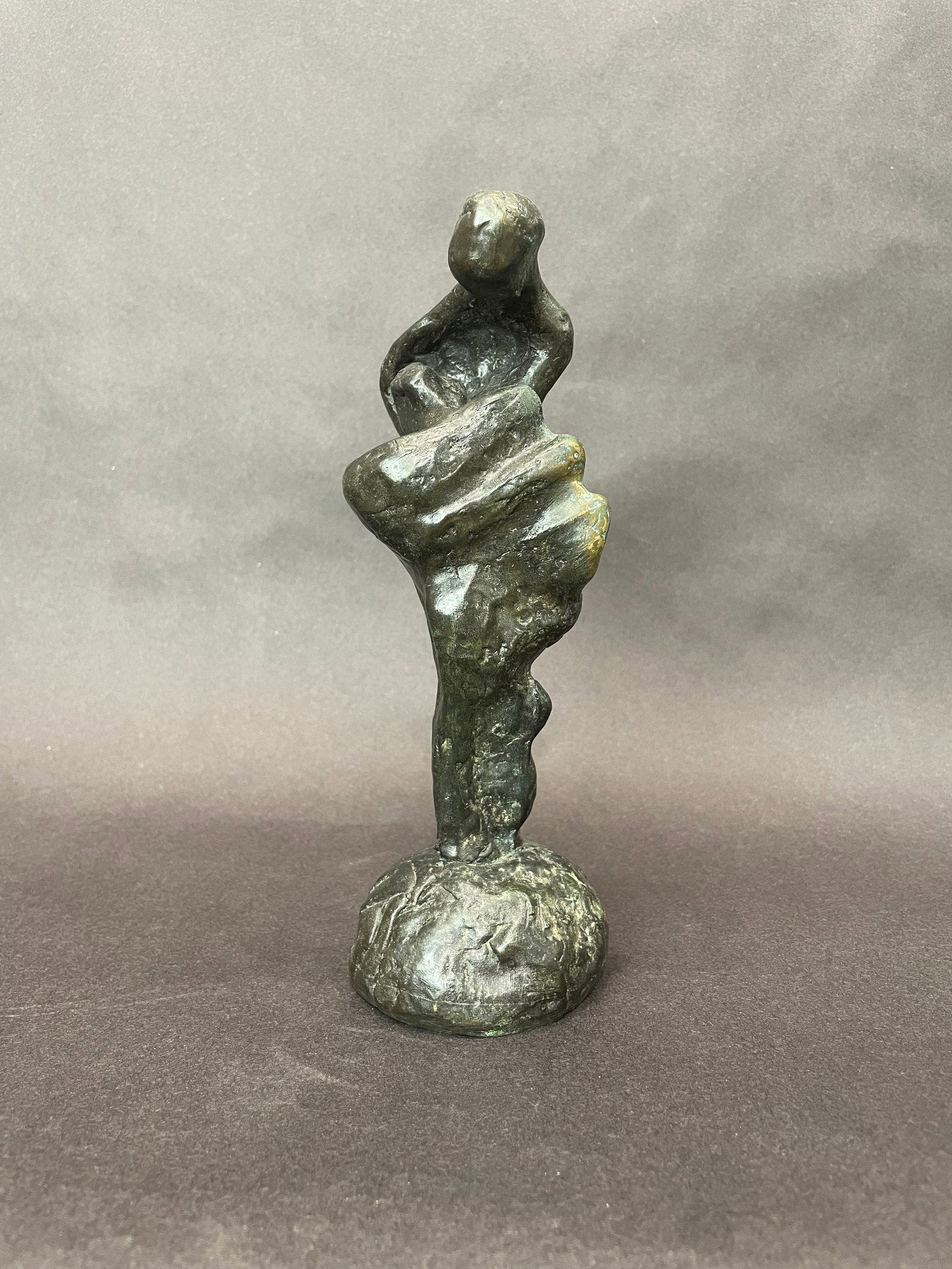 Stiebel Original Figurative Bronze Sculpture: Artist: Stiebel Title: Contemplation Medium: Bronze Art Size: 8.5h x 2.25w x 3.5 d Edition: Original Signature: Signature on the base of the scuplture. Artwork is ready to display.