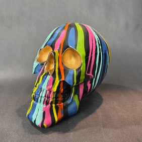 Multi Color Skull 7.5 H x 7 W x 10 D Resin Sculpture
