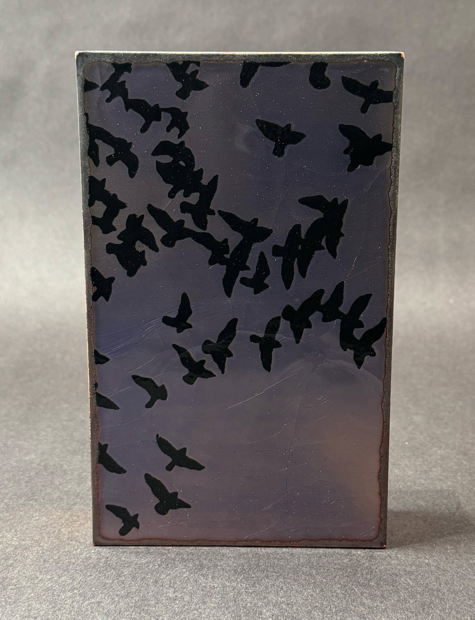 Houston Llew 8.5" H x 5.25" W Retired Spiritile 010: Aloft: Artist: Houston Llew (b. 1980s) American Title: 010: Aloft RETIRED Medium: Copper and Enamel on Wood Artwork Size: 8.5 H x 5.25 W x 1.75 D Weight: 2.5 lbs. Edition: Open This evocative mixed-media art