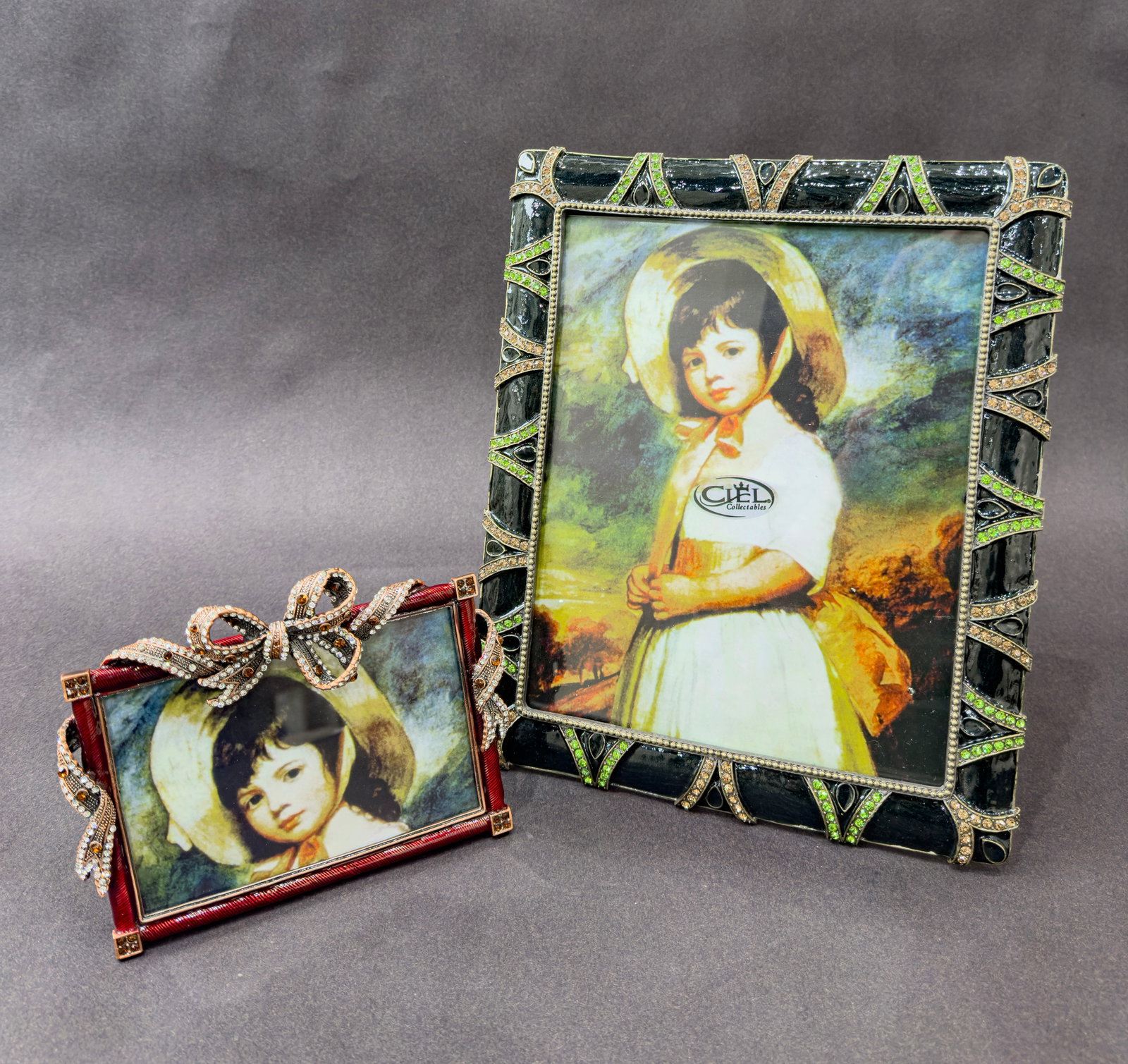 Ciel Collectibles 4x6 and 8x10 Photo Frame Set of 2: Artist: Ciel Collectibles Title: Timeless Enamel Picture Frame Set Medium: Hand-set Swarovski crystals on hand-painted enamel over solid pewter base Green Frame Size: 12" H x 10" W x 5" D Red Frame Si