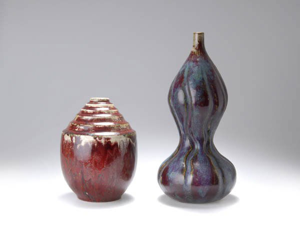 Pierre Adrien Dalpayrat, Bourg-la-Reine (Seine), V: Tall and elegant sang-de-boeuf and turquoise-glazed stoneware vase in double-gourd form, irregular vertical fluting, short, narrow, cylindrical neck. H. 35 cm. Incised signature on the base: Dalpayrat