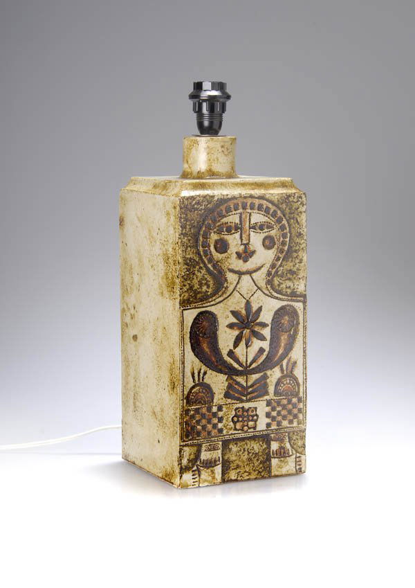 Roger Capron, Vallauris, Lamp Foot, around 1965: Unique specimen. H. 35 cm. Earthenware, glazed, front with ornamental girl design in flat relief, rubbed with brown engobe, engobe flakes all over. Signed and marked on reverse side. Electrified, neck