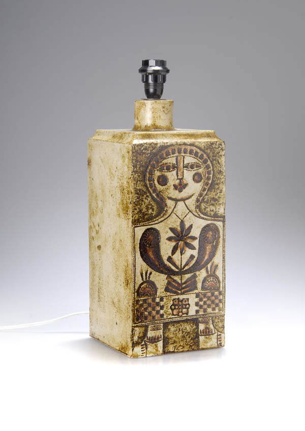 Roger Capron, Vallauris, Lamp Foot, around 1965: Unique specimen. H. 35 cm. Earthenware, glazed, front with ornamental girl design in flat relief, rubbed with brown engobe, engobe flakes all over. Signed and marked on reverse side. Electrified, neck
