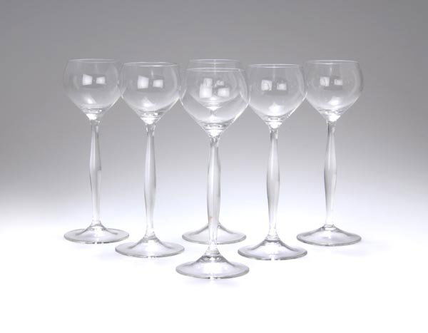 Peter Behrens, Six Wine Glasses, 1899: H. 20.7 cm. Executed by crystal glass factory Benedikt von Poschinger, Oberuwieselau. Colorless glass. Ausst. Kat. Peter Behrens und Nürnberg, Germanisches Nationalmuseum Nürnberg 1980, S. 60, Nr. 6