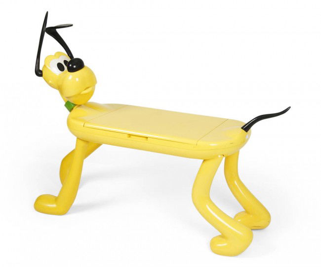 Walt Disney, USA, Kinderschreibtisch und Sitzmöbel: Manufactured for Starform, Netherlands. Walt Disney comic figure 'Pluto'. Yellow hard plastic with applied rubber elements, desktop with shelves. Marked: DISNEY BY STARFORM (plaque with Mickey Mouse e