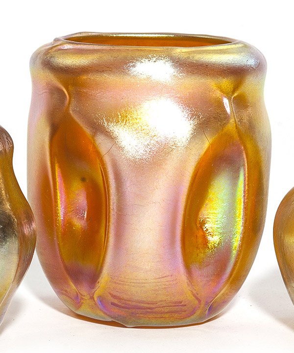 Tiffany Vase: Unusual Tiffany vase, brightly iridized gold Favrile circular body with five oval recesses, signed "L.C.T. W 8405," 4" ht.