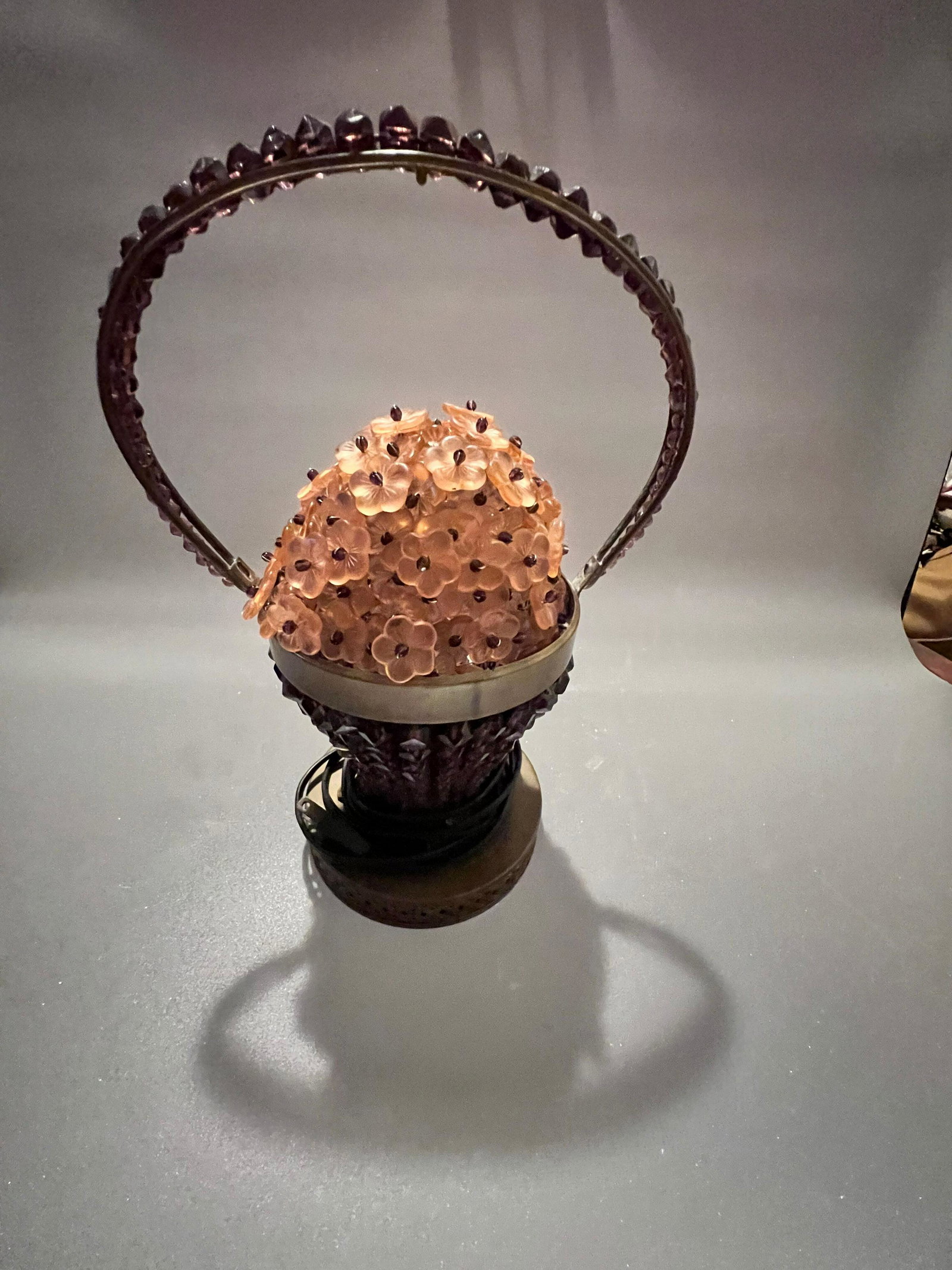 Czech Floral Bronze Table Lamp: Czechoslovakian floral glass basket lamp on pierced brass stand. Measures 11" high. Circa 1900s.